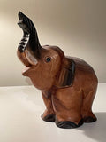 Fin vintage elefant figurin i trä i nyskick.
