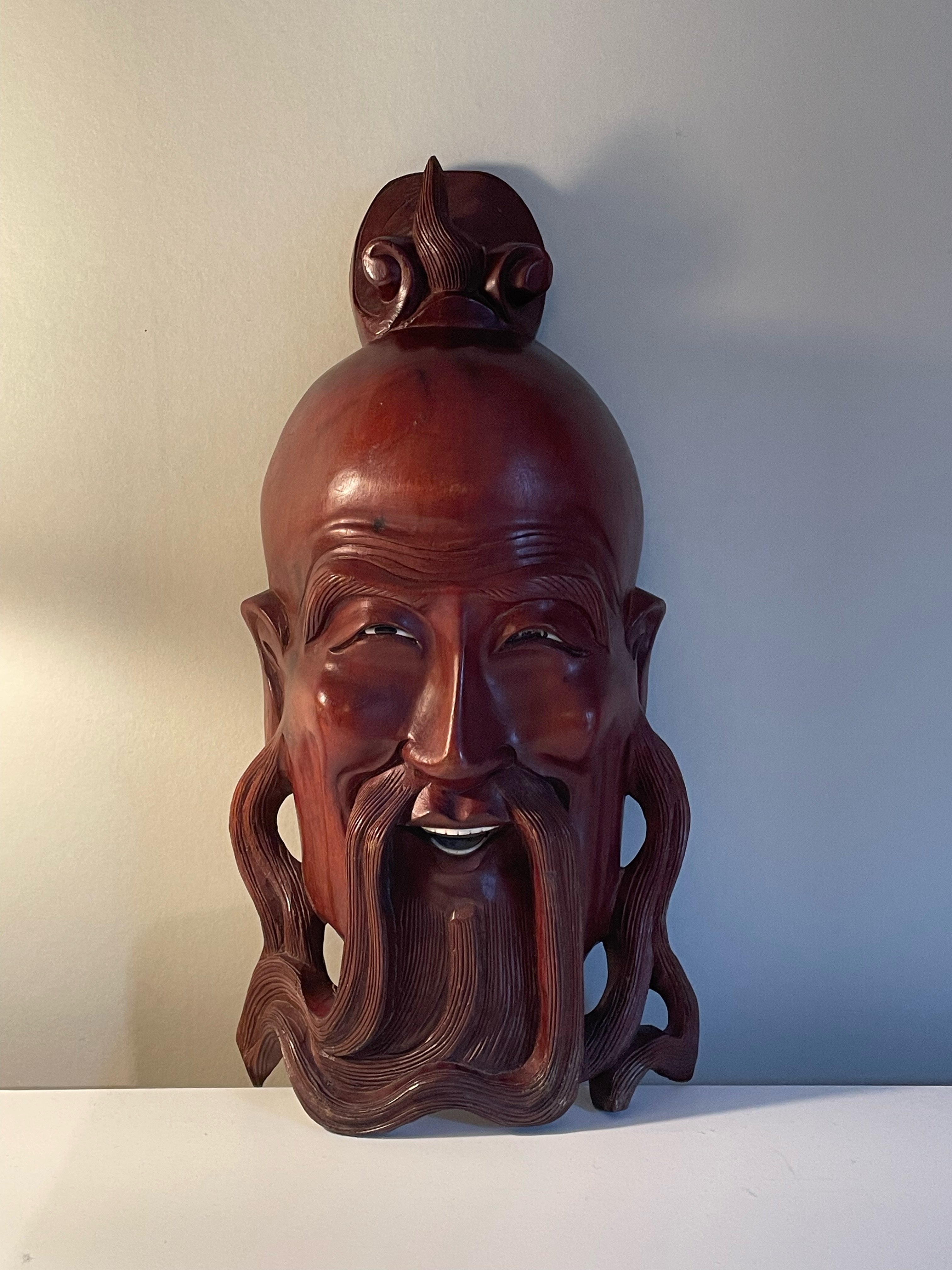 Vacker antik Kinesisk ansiktsmask i trä i mycket fint skick.