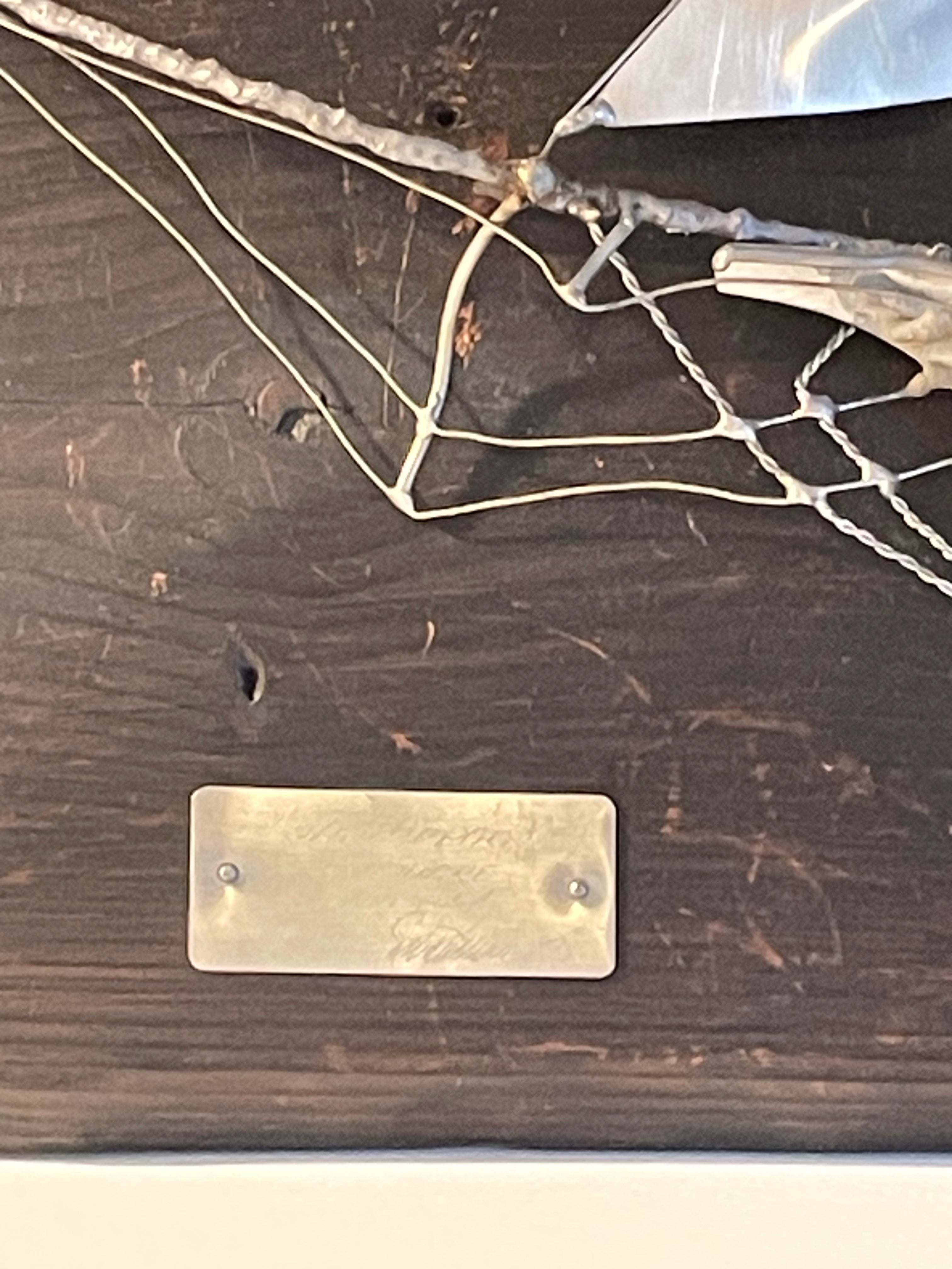 Fin modell utav en Skonare i tenn utav konstnären Urban Ström.
