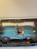 Fin modell från Road Tough en Chevrolet Corvette 1957.