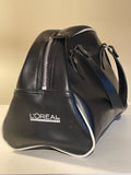 Snygg duffelbag i äkta skinn från L’OREAL i nyskick.