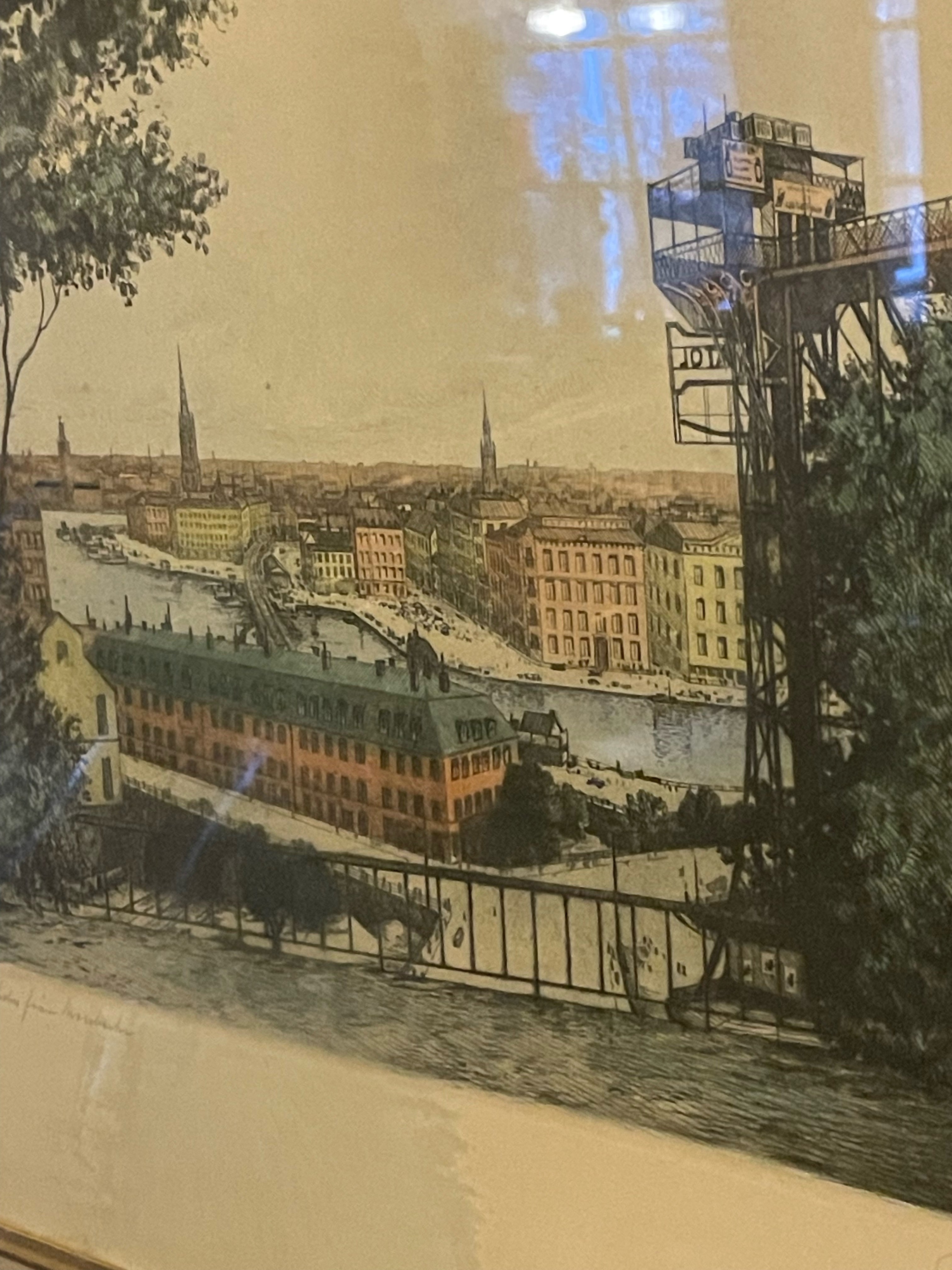 En vacker colorerad etsning utav konstnären Jean Fredrik Theodor Skoglund. Det gamla Stockholm, Mosebacke på söder. Tavlan är signerad.